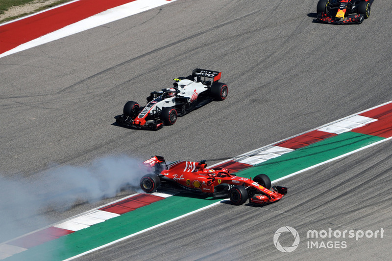 Sebastian Vettel, Ferrari SF71H spins after contact with Daniel Ricciardo, Red Bull Racing RB14 
